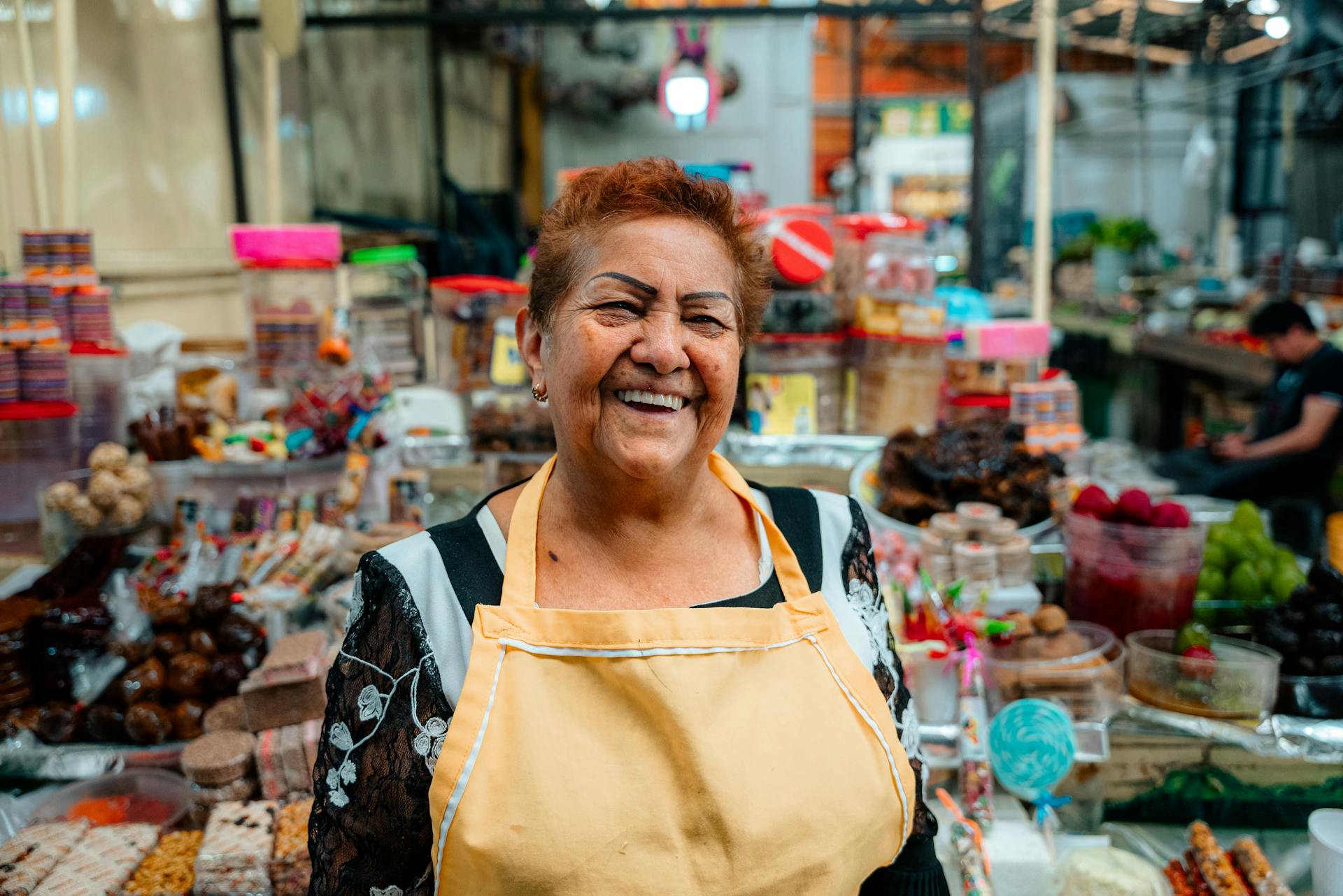 Smiling Woman Selling on Market