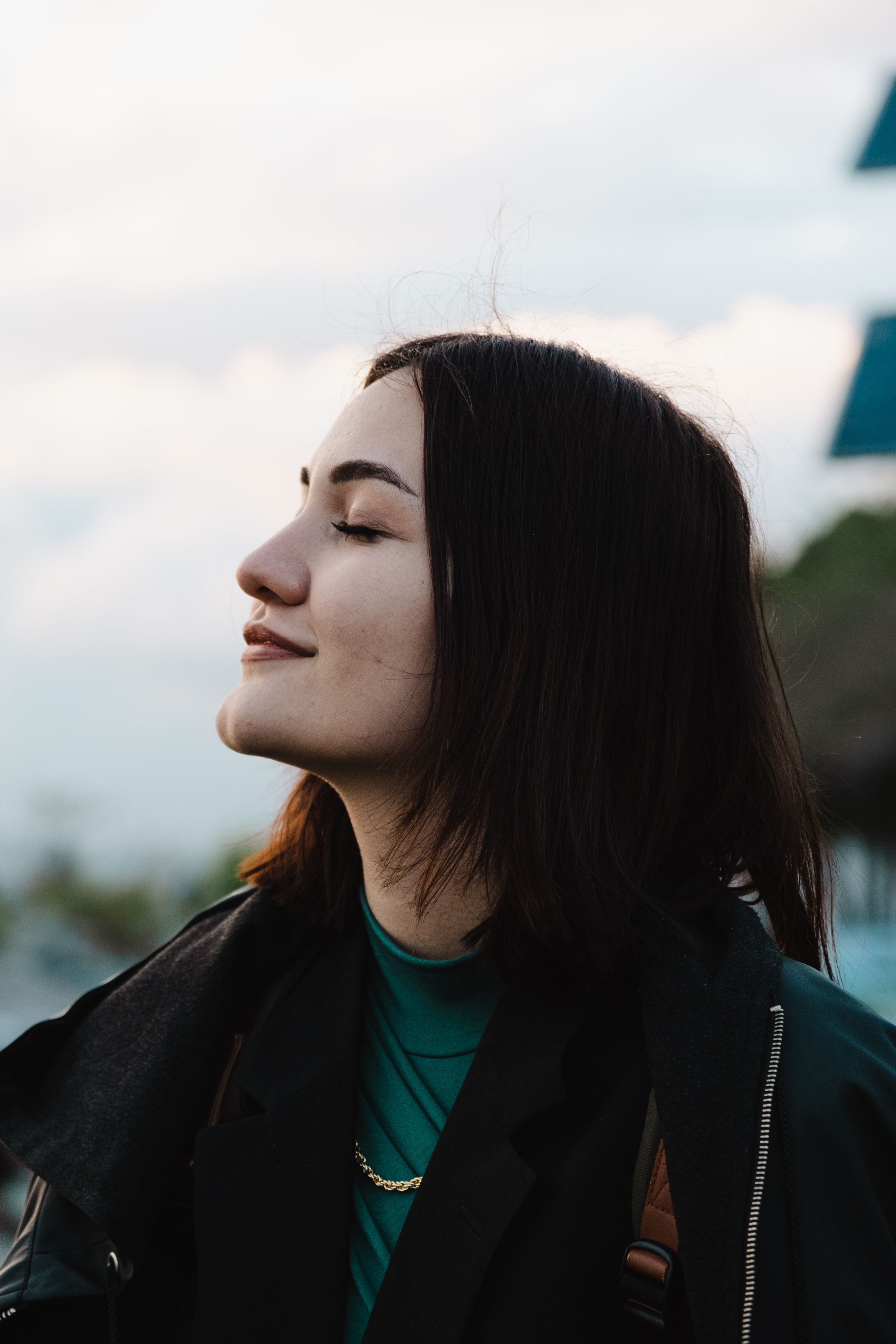 Portrait of a Woman with her Eyes Closed · Free Stock Photo