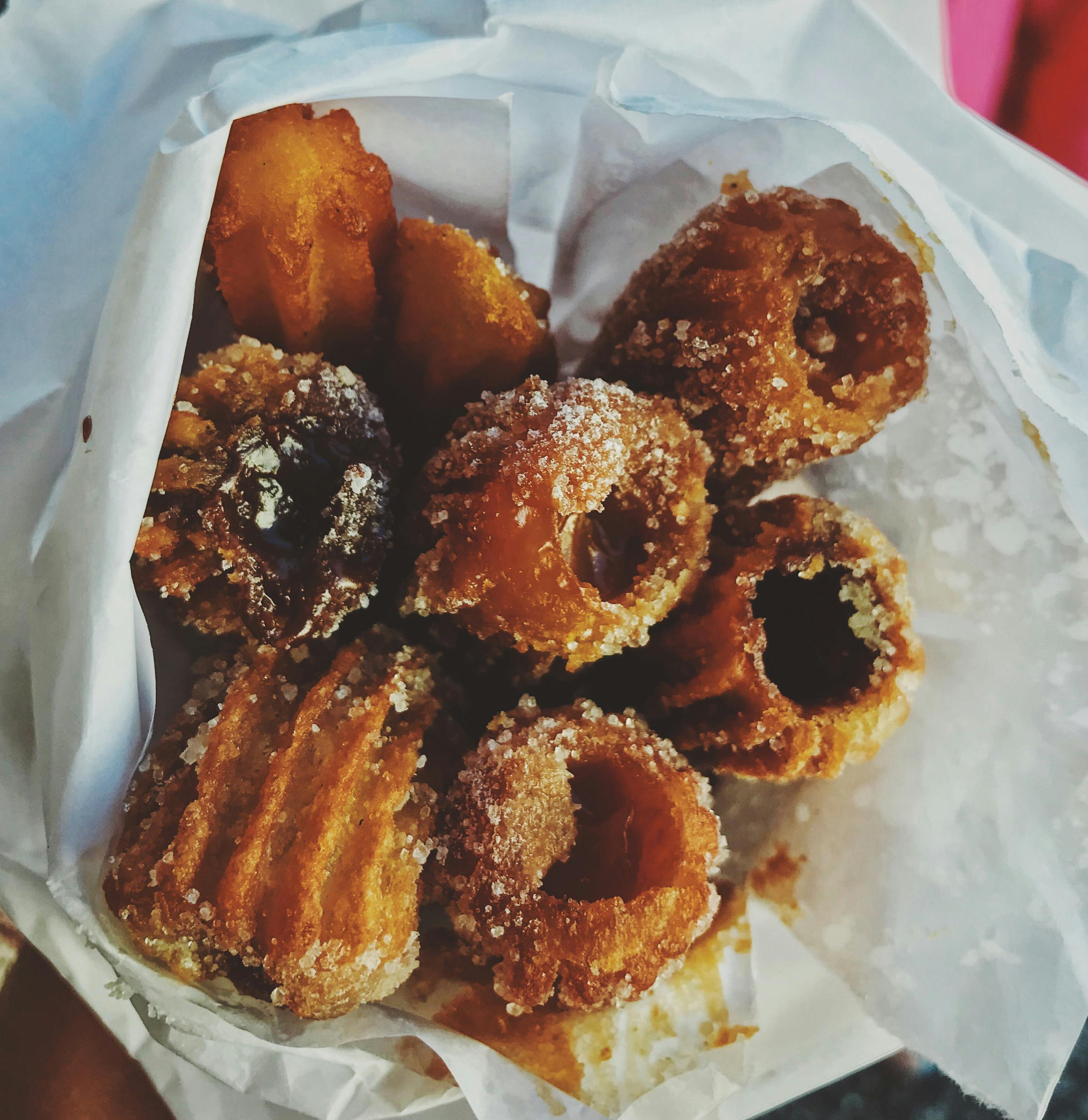 Foto profissional gratuita de churros