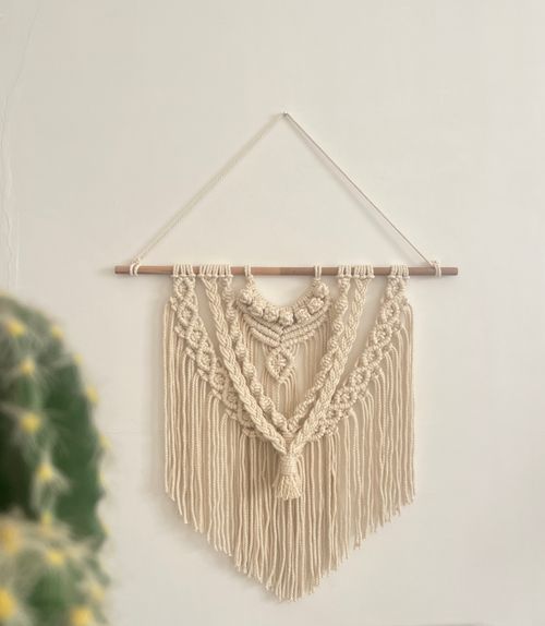 Handcrafted macrame wall hanging, photo by Safa Adnan on Pexels