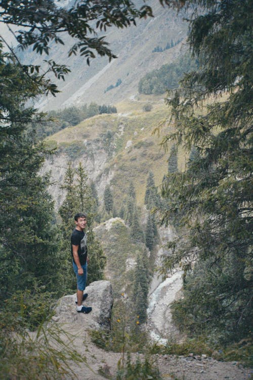 Man Standing on Edge over Abyss