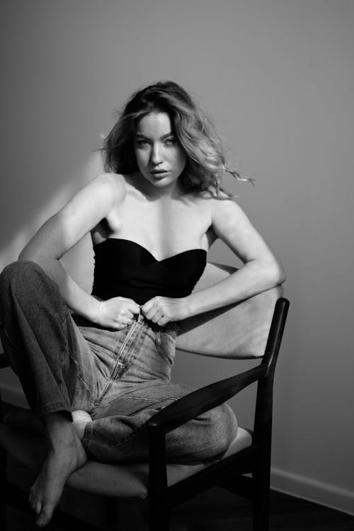 Young Woman in a Trendy Outfit Posing in Studio 