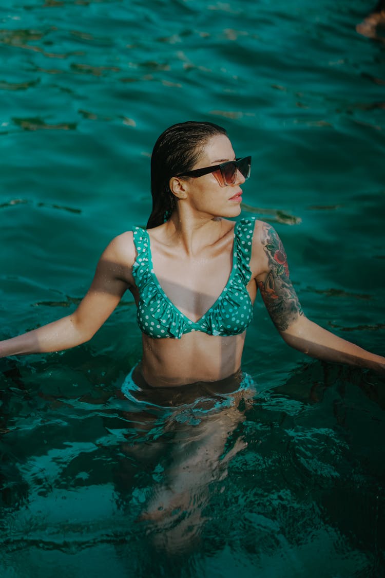 Woman In Bra Posing In Water 