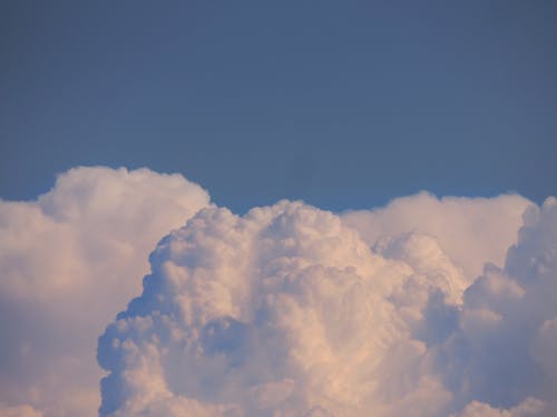 Free Big clouds against blue sky Stock Photo
