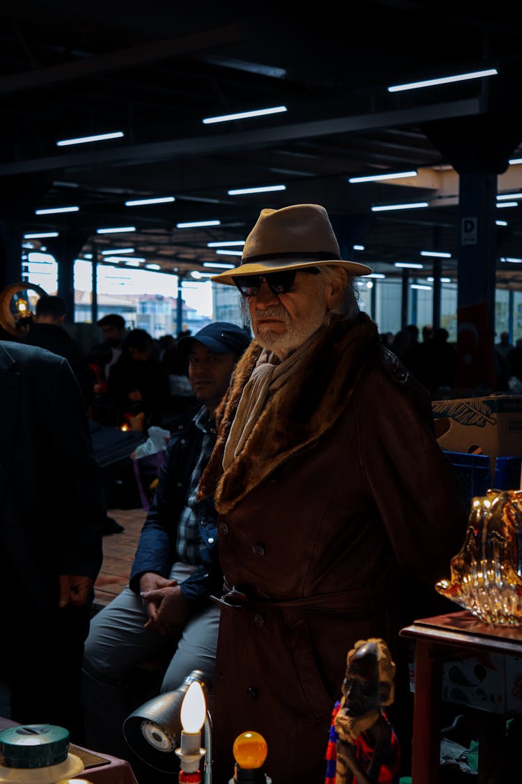 Elderly Man In Hat And Coat