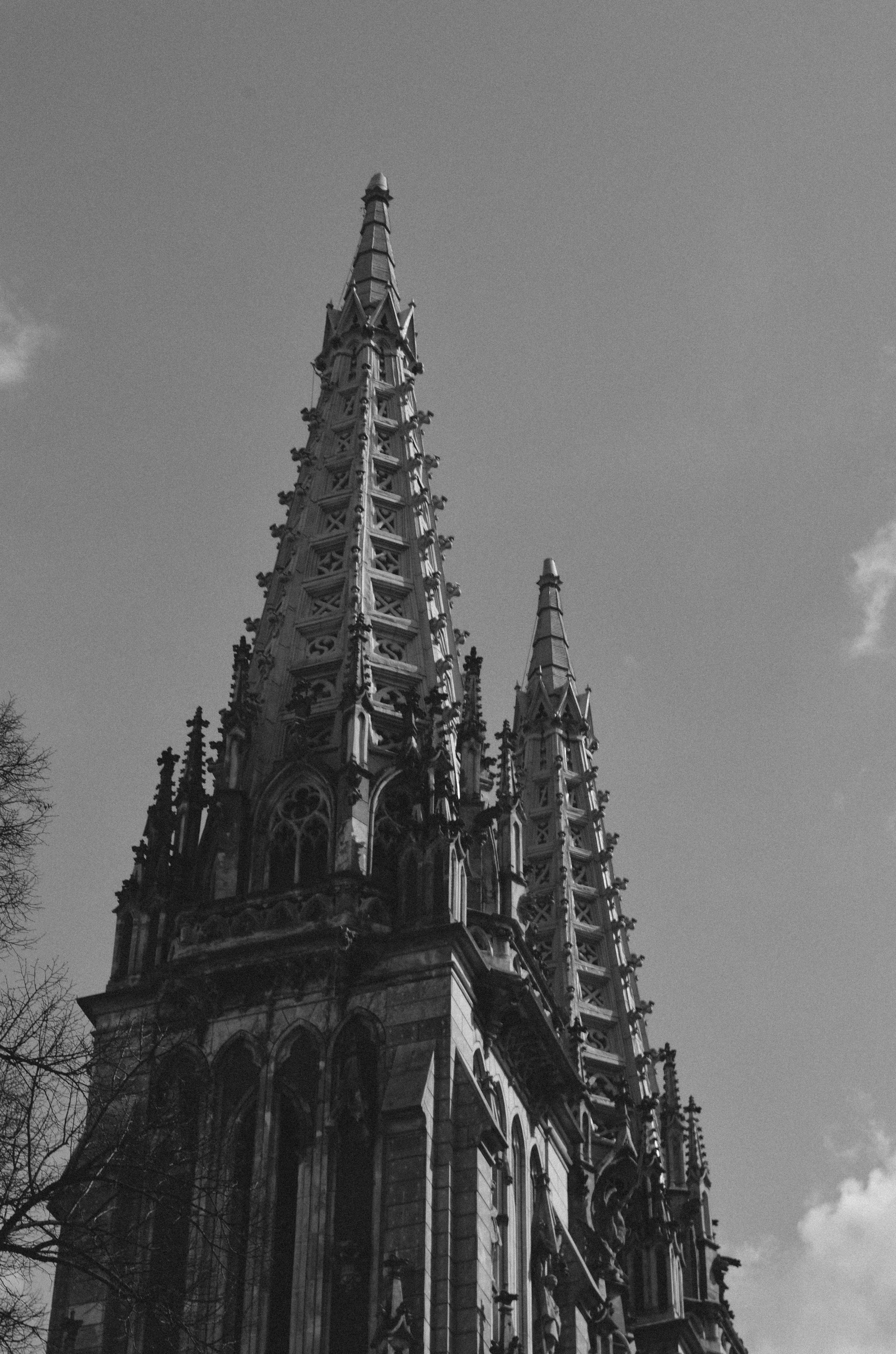 Black and White Photo of a Gothic Tower · Free Stock Photo