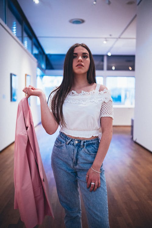 Woman Posing with Pink Suit