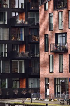 Close-up of modern urban apartment buildings showcasing balconies and architecture.