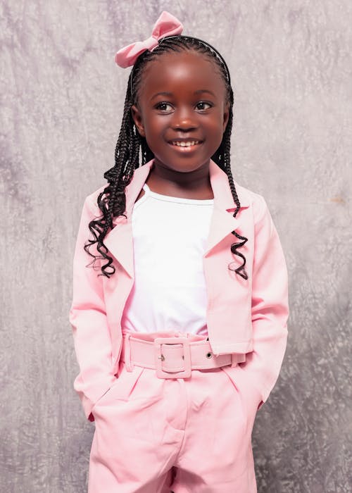 Smiling Girl in Pink Clothes