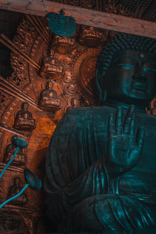 Close-up of a Carved Buddha Statue in a Temple 