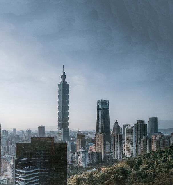 A breathtaking view of Taipei City skyline with the iconic Taipei 101 and surrounding skyscrapers.