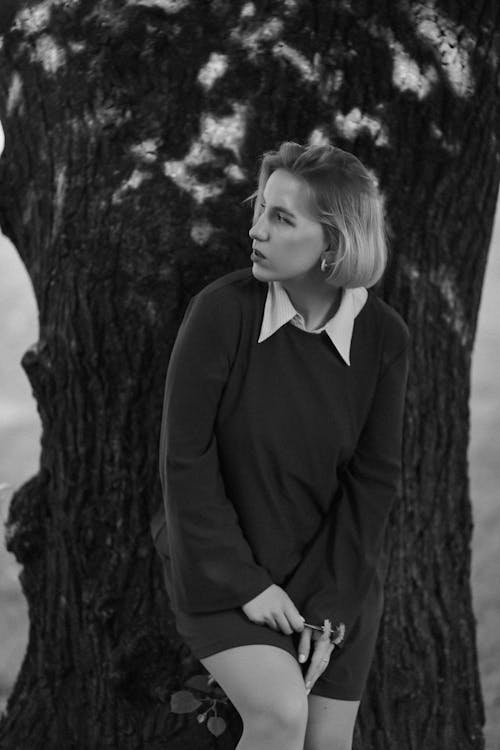 Portrait of Woman by Tree in Black and White