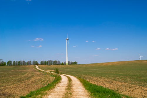 Бесплатное стоковое фото с ветровая турбина, грязная дорога, за городом