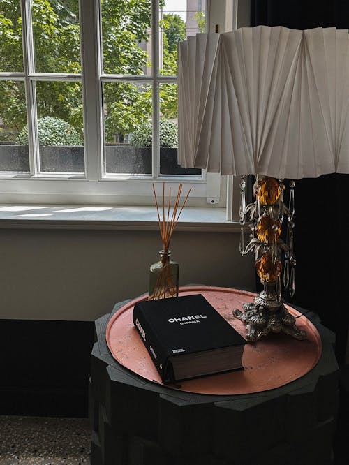 Lamp and Book on Table