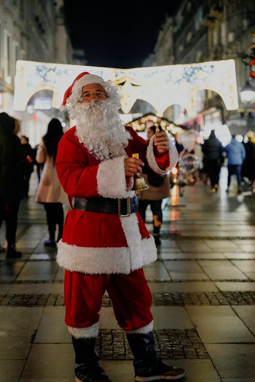 Santa Claus in Town at Night