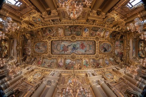 Free Intricate Baroque ceiling with opulent ornaments and classical frescoes. Stock Photo