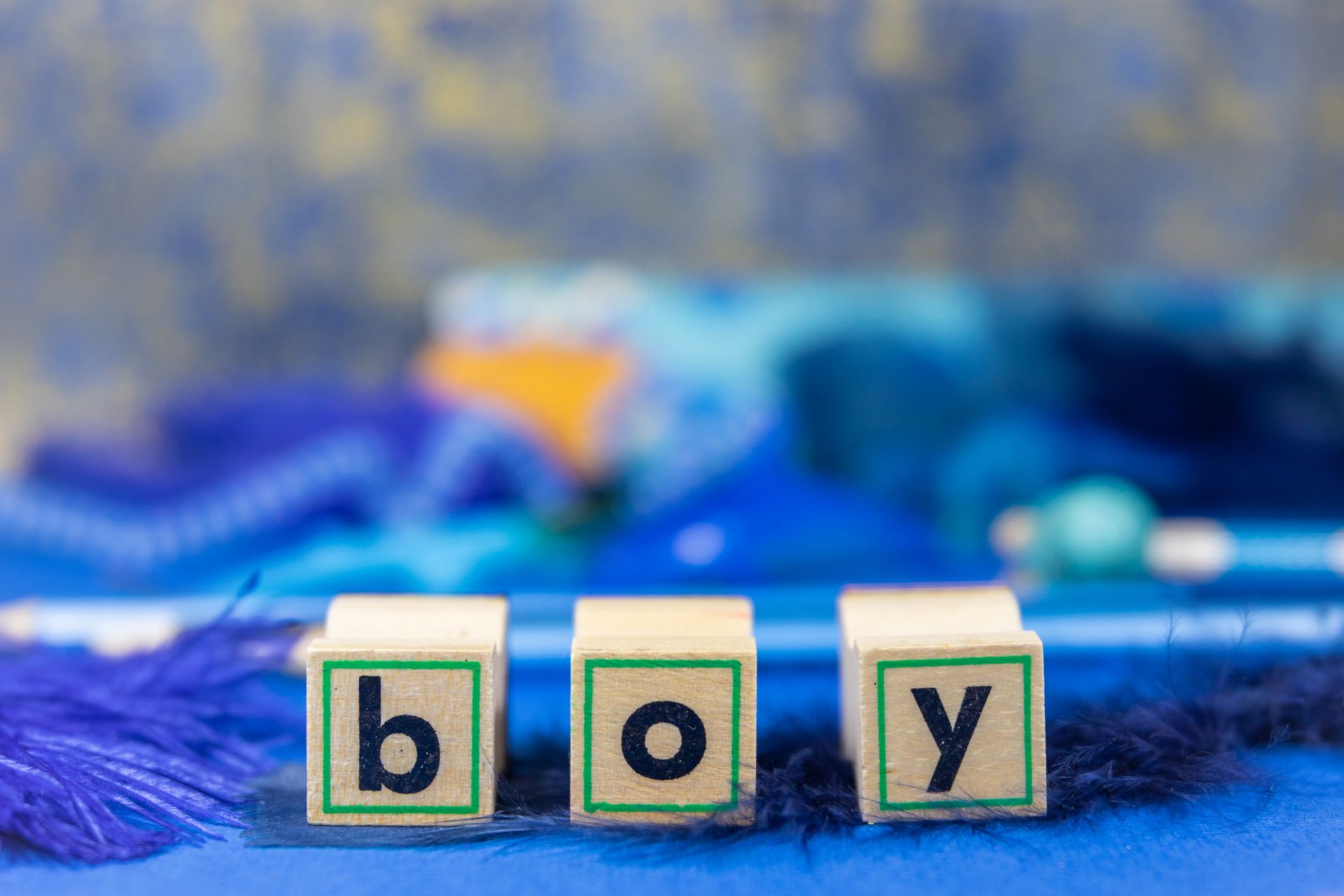 Three Wooden letter blocks