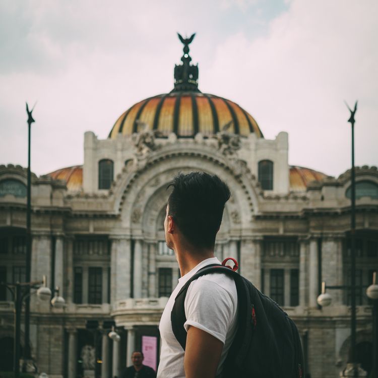 Man Standing Near Building · Free Stock Photo