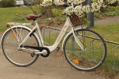 White Bike with Flowers in Wicker Basket