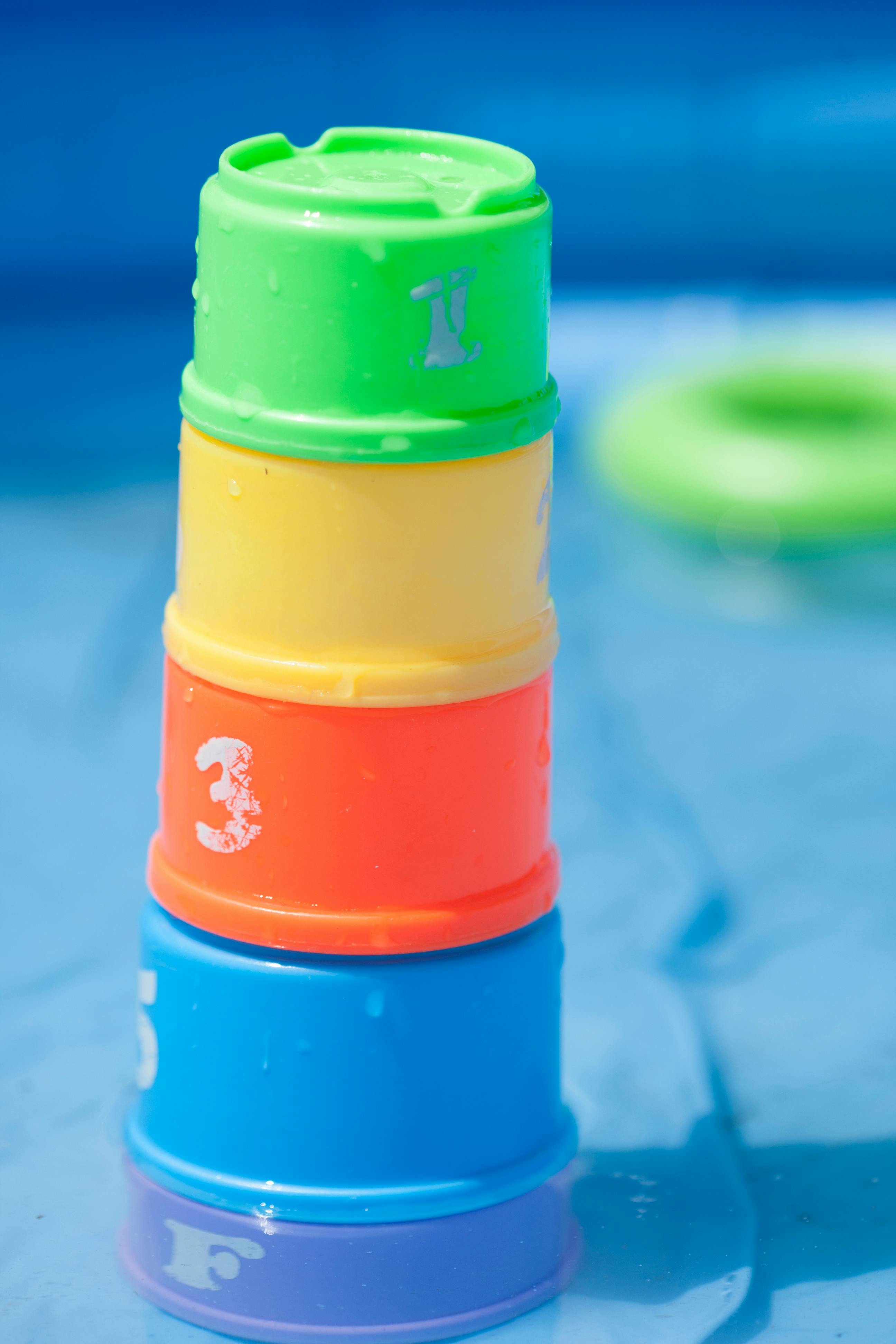 Free stock photo of pool safety, stacking cups, swimming