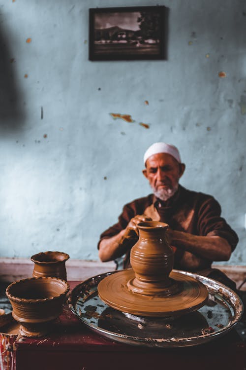 Potter Making a Clay Pot 