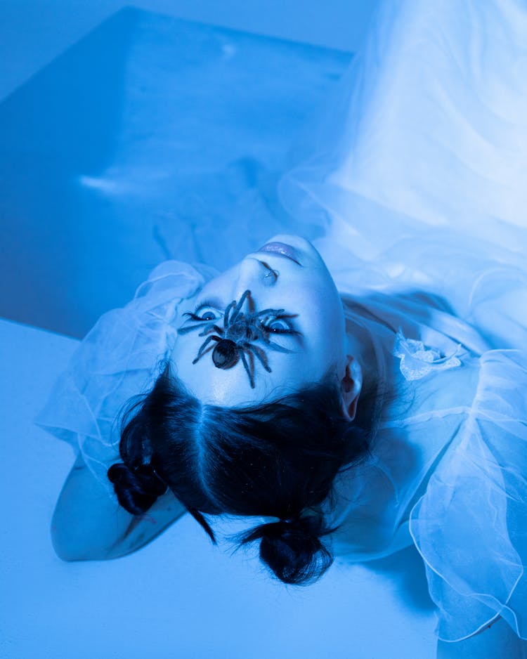 Woman With Spider On Face