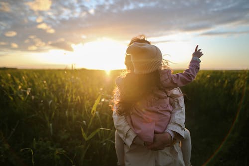 Free Mother and Daughter on Grass Stock Photo