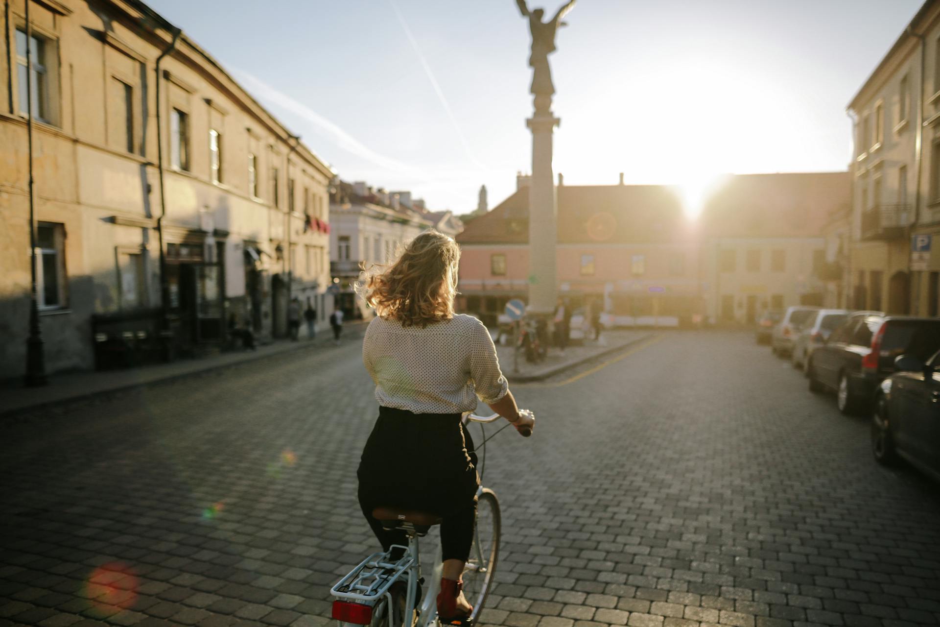 Woman Riding A Bike