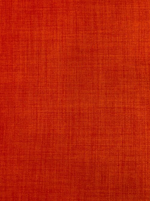 Free Close-up view of plain red fabric texture, perfect for backgrounds and design projects. Stock Photo