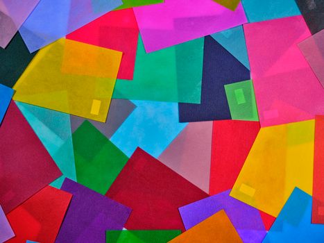 A colorful abstract image with overlapping geometric shapes creating a vibrant design.