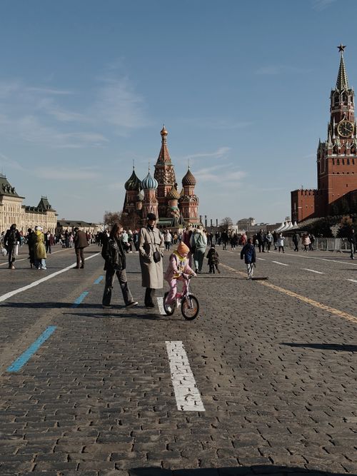 Free A busy day in Moscow's Red Square with people walking near iconic St. Basil's Cathedral. Stock Photo