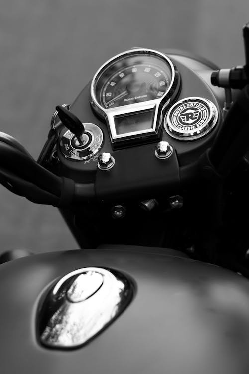 Black and White Photo of the Tank and Speedometer in a Royal Enfield Motorcycle 