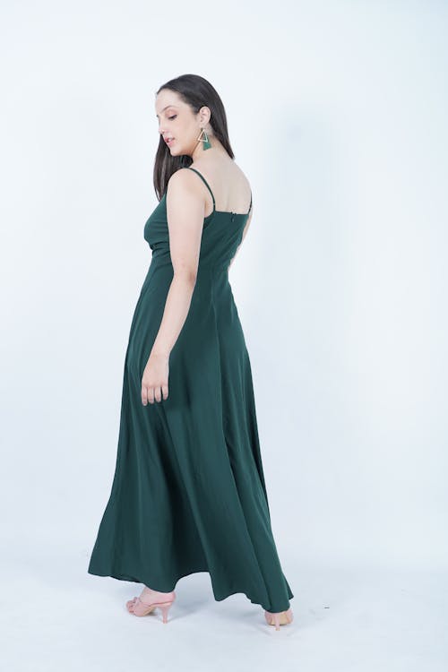 Back View of a Woman in Green Evening Dress 