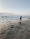 Person Running At The Beach