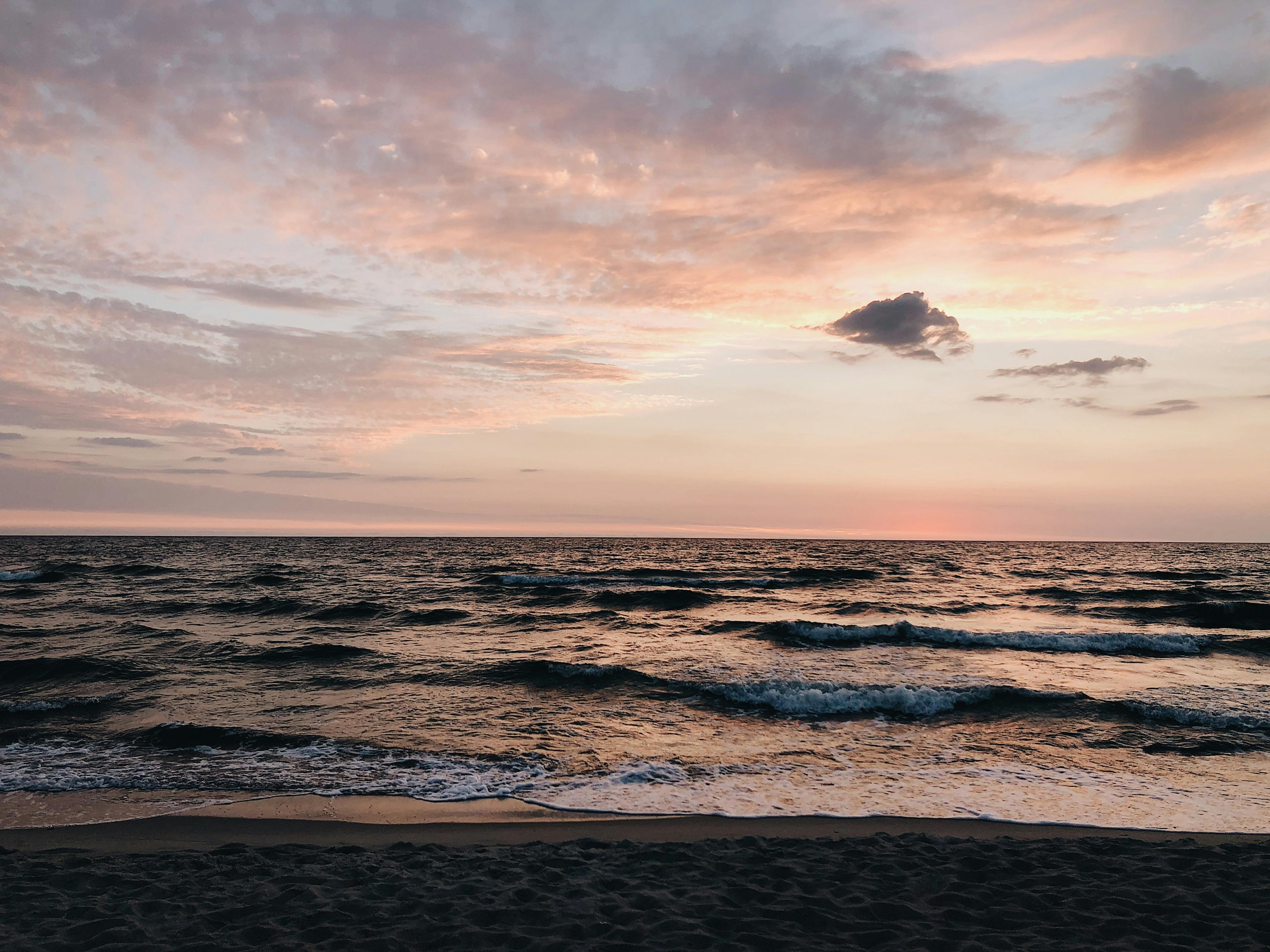 seashore-during-sunset-free-stock-photo