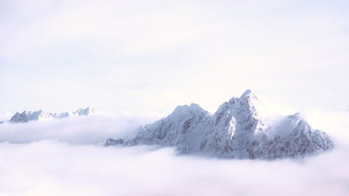 Ingyenes stockfotó erodált, fehér felhők, hegyek témában