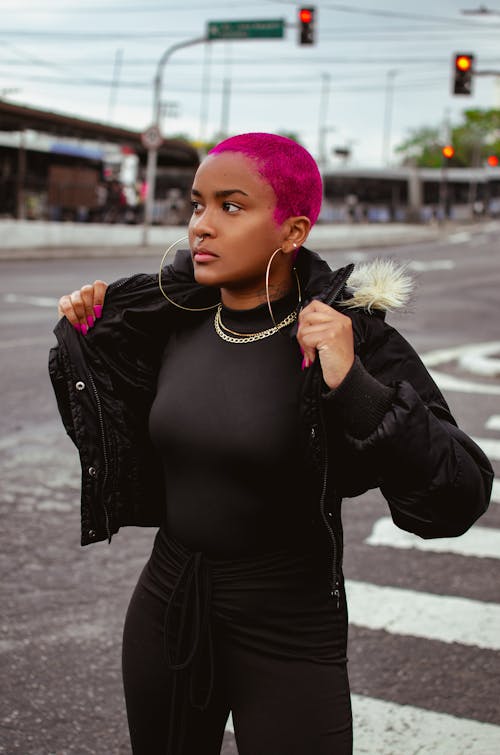 Woman with Pink Hair Standing on Street