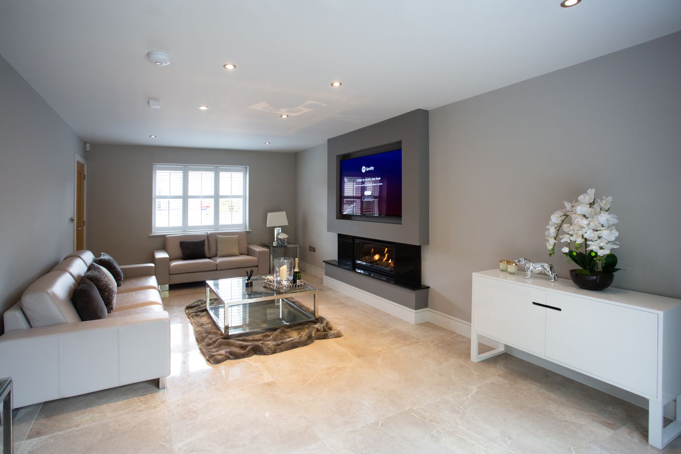 Elegant modern living room with a cozy fireplace