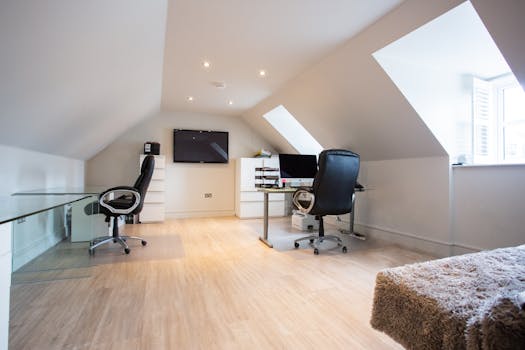 Bright attic office with modern furniture and stylish decor in Colchester, UK.
