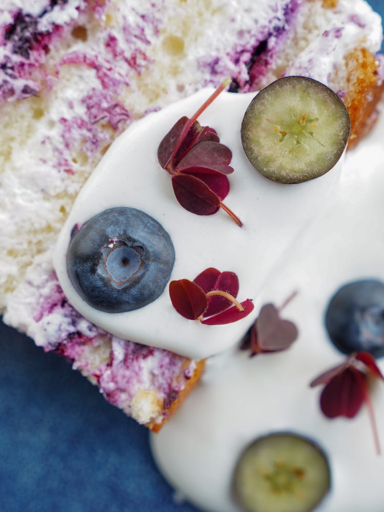 Close-up On Yogurt With Blueberries On Cake Slice