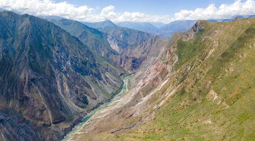 Free Stunning aerial image showcasing the lush valley and river in Curahuasi, Apurímac, Peru. Stock Photo