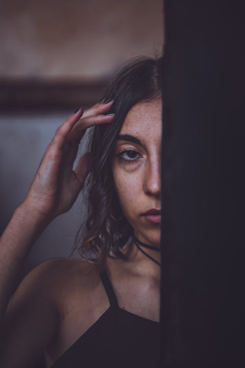 Free Young Woman Posing in an Abandoned Building  Stock Photo