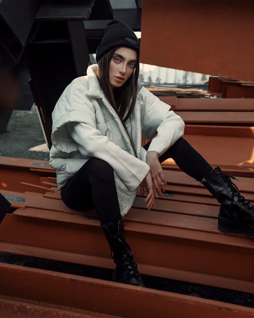 Young Woman in a Trendy Autumn Outfit Posing Outdoors 