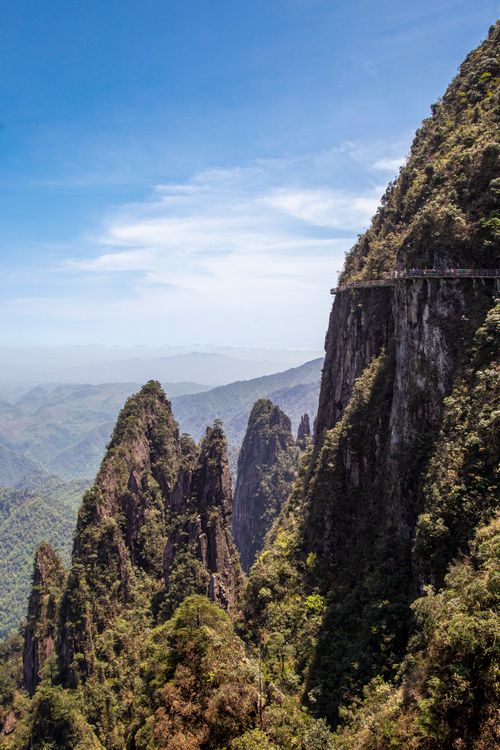 Free A breathtaking view of rugged mountains and rock formations under a clear blue sky, ideal for nature lovers. Stock Photo