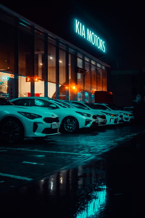 cars in automobile dealership showroom display