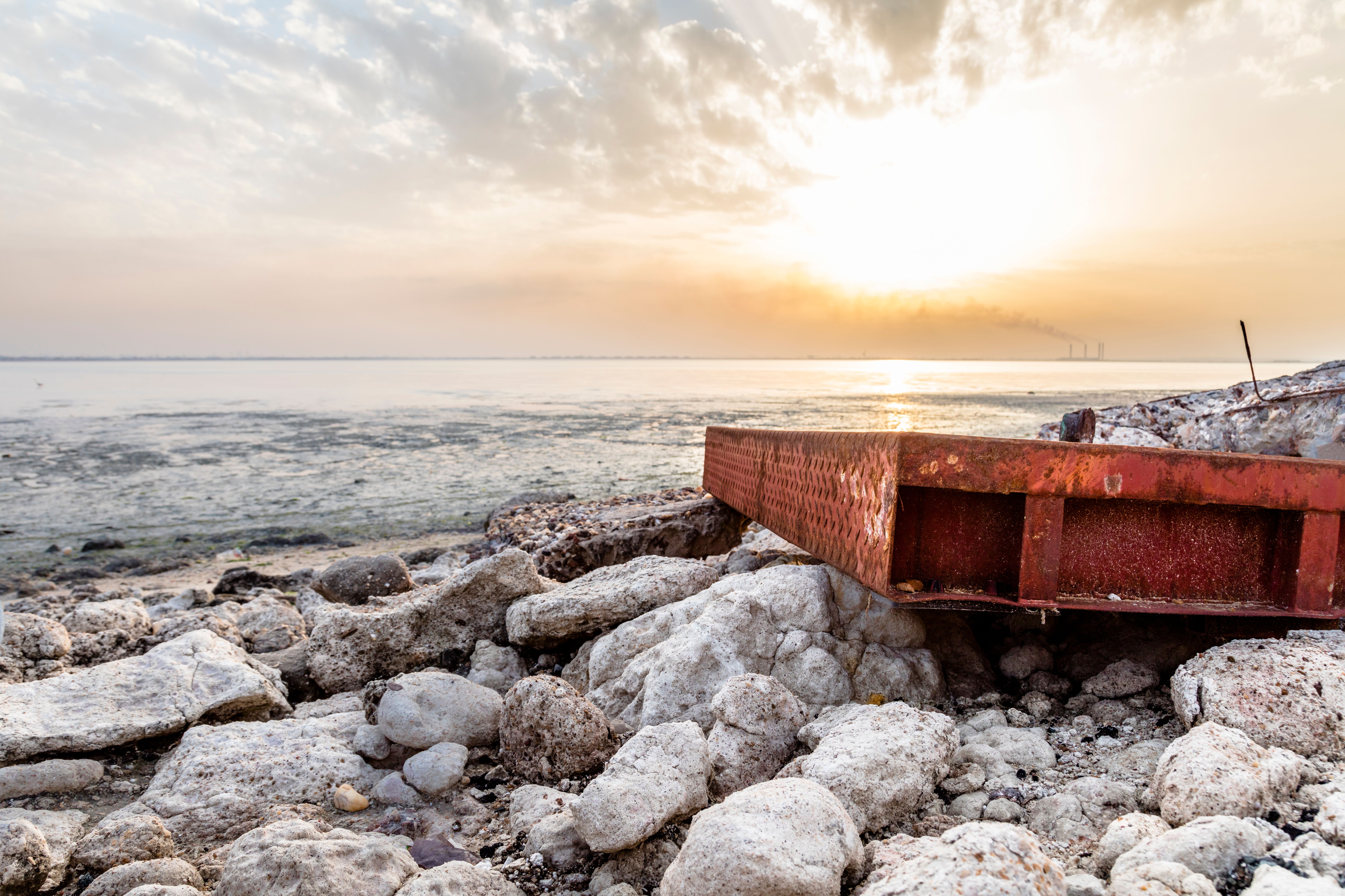Rusty, Abandoned Platform on Sea Shore · Free Stock Photo