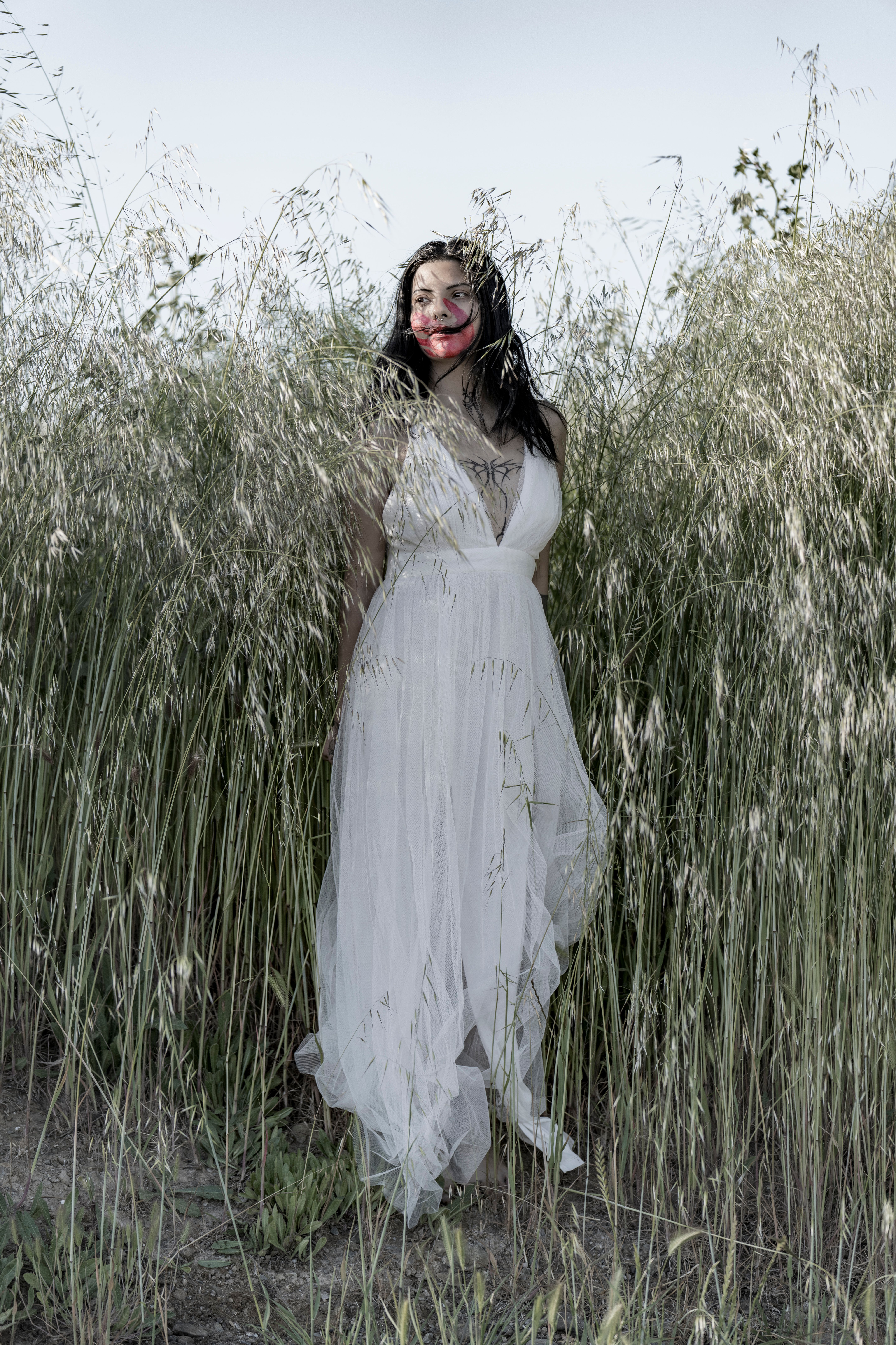 Woman in White Dress  Free Stock Photo