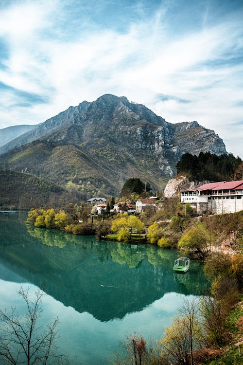 Majestic Mountain Towering over Lake