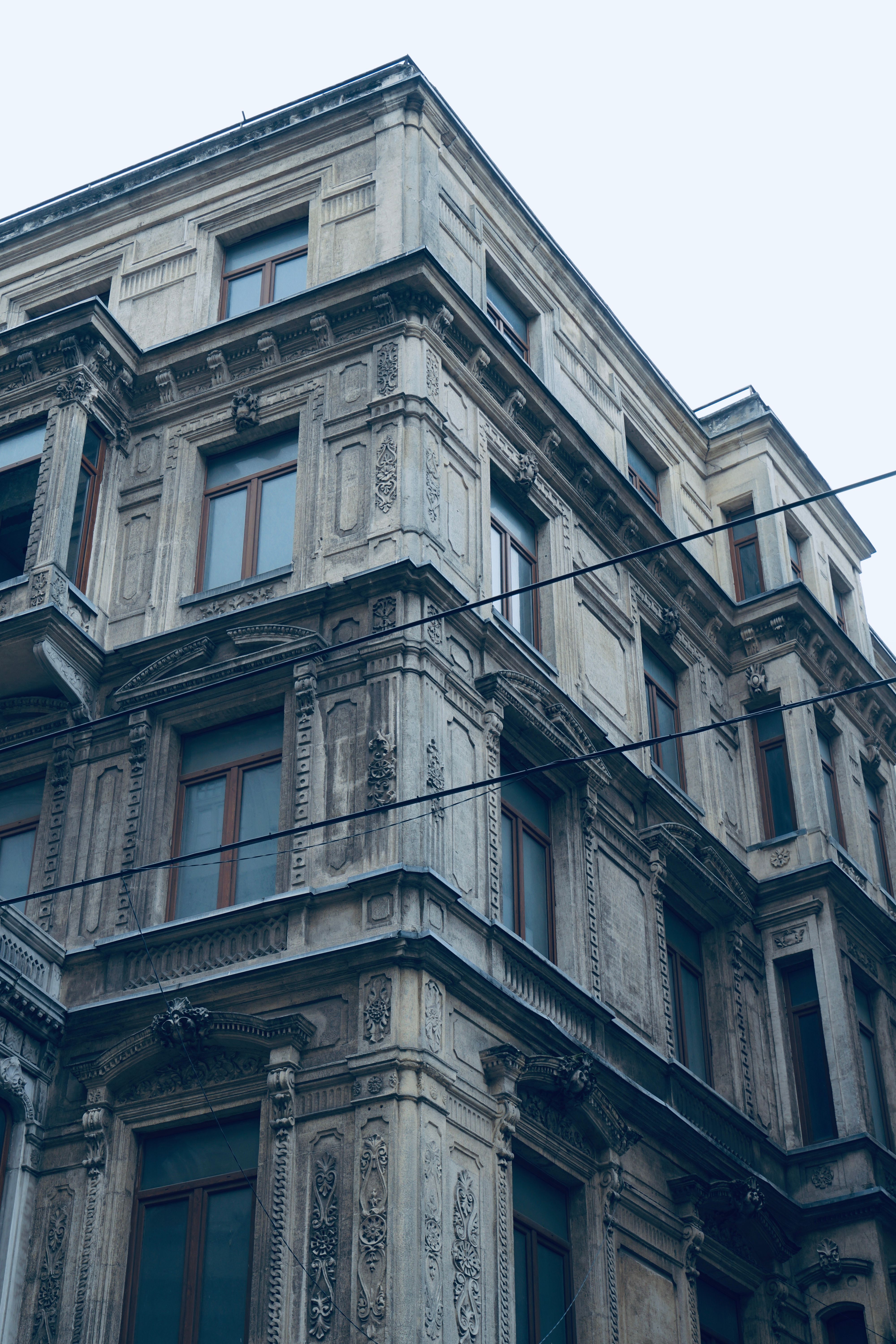 Low Angle View of Corner of Old European Building · Free Stock Photo