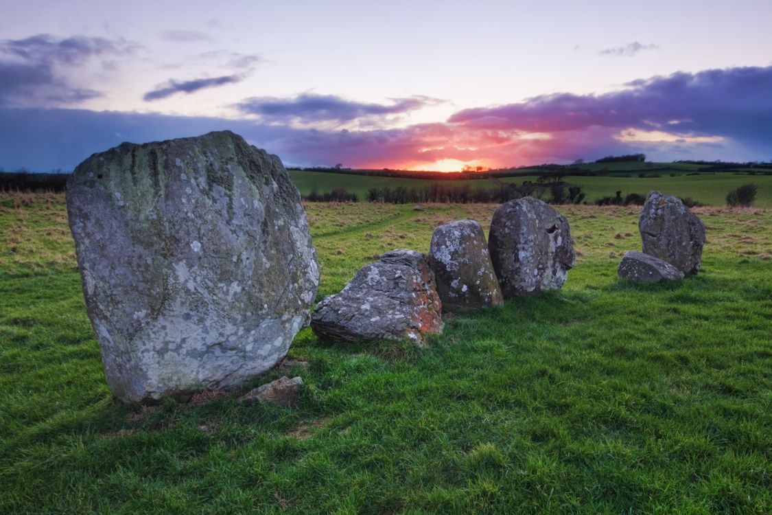 Rock Formation on Green Grass Field · Free Stock Photo